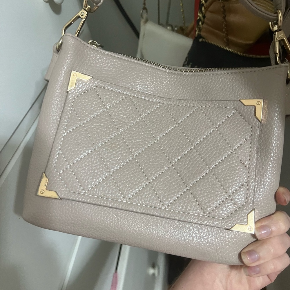 Beige purse with gold square